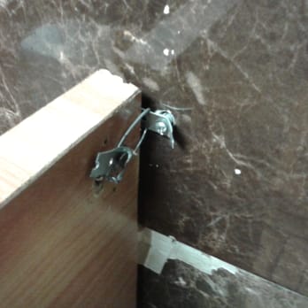 All Star Asian Buffet - This is how they hold the bathroom dividers on the wall - Chinese Near Me - Uniontown, Pennsylvania
