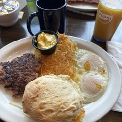 Clawson's Wheelhouse - Eggs over easy hash browns local fresh sausage with home made biscuits