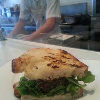 Summer Kitchen +bakeshop - Hearst ranch burger, caramelized onions, house made pickles, wild arugula, and provolone cheese - New American Near Me - Berkeley, California