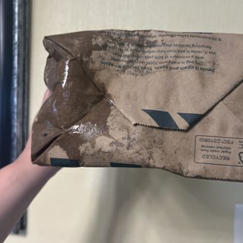 Starbucks - a person holding a brown envelope - Coffee & Tea Near Me - Janesville, Wisconsin Starbucks - a person holding a brown envelope - Coffee & Tea Near Me - Janesville, Wisconsin