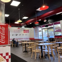 Decent sized indoor seating area. Hee Decent sized indoor seating area. Hee