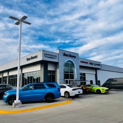 Dan Deery Motor Company - Waterloo store front. Main entrance on the right, and service entrance on the left.