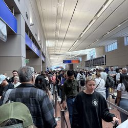 Harry Reid International Airport - Ridiculous line for security.  I know it can be done better than this. Been to busier airports and much better run ones.