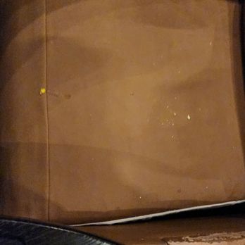 Look - Was worse we cleaned a bit ourselves should showed before we cleaned was wet and gooey. - Cinema Near Me - Downey, California