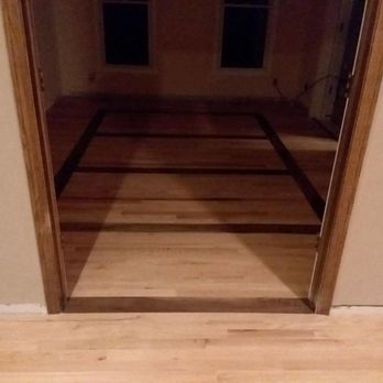 2 Brothers Flooring - a hardwood floor in a house - Flooring Near Me