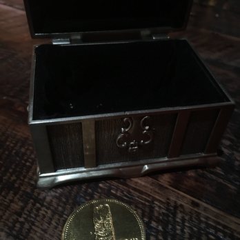 Tiki Rock - The bill comes in a treasure chest with gold chocolate coins! - Tiki Bars Near Me - Boston, Massachusetts Tiki Rock - The bill comes in a treasure chest with gold chocolate coins! - Tiki Bars Near Me - Boston, Massachusetts