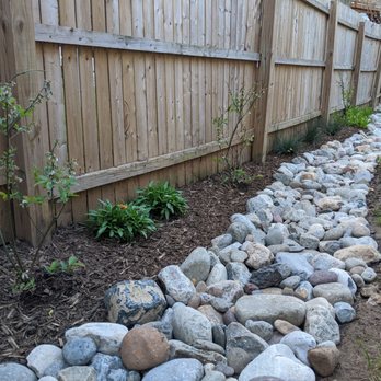 Arterra Landscapes - Brand new dry creek to direct flood water to retention area - Landscaping Near Me - Kensington, Maryland Arterra Landscapes - Brand new dry creek to direct flood water to retention area - Landscaping Near Me - Kensington, Maryland