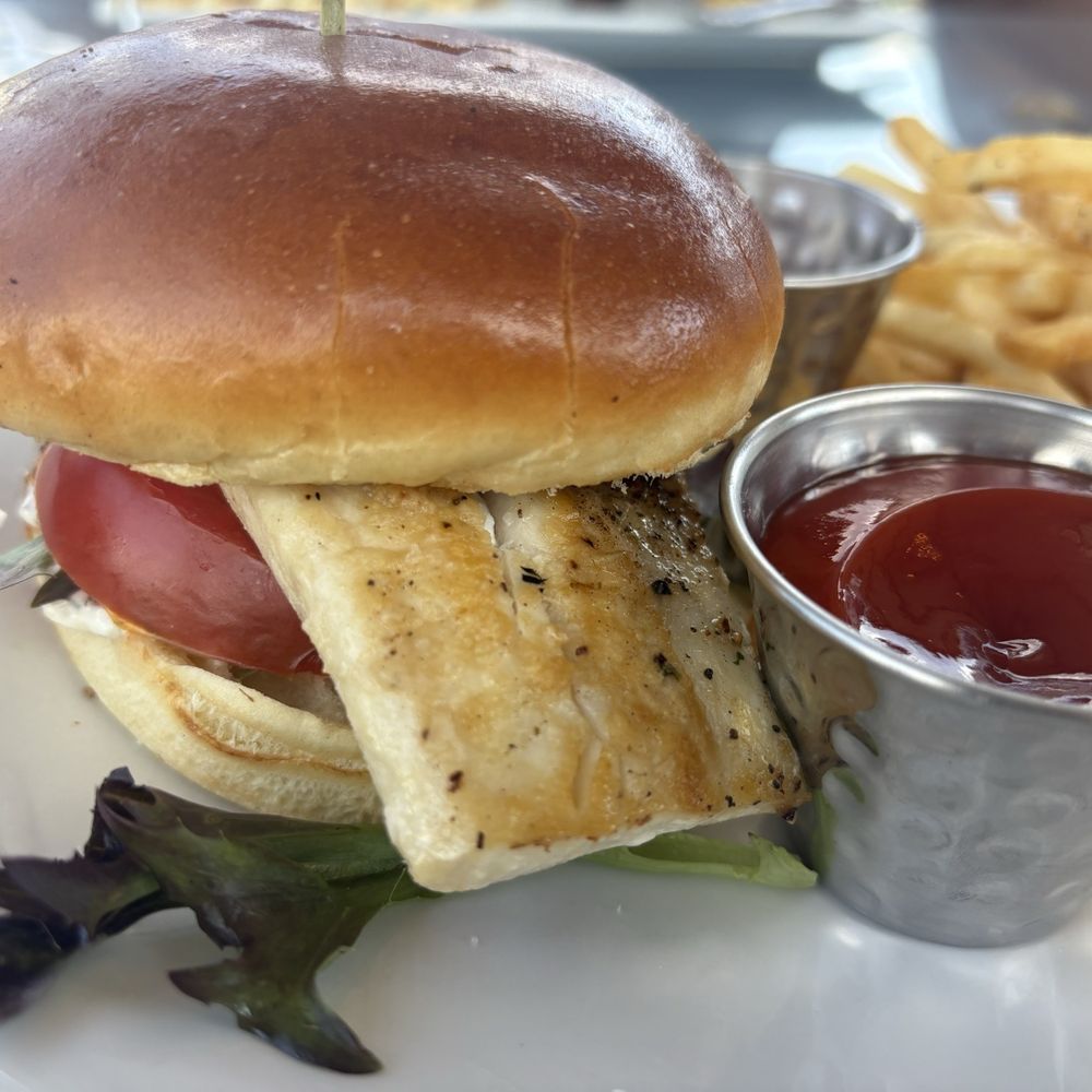 Mahi mahi sandwich with fries Mahi mahi sandwich with fries