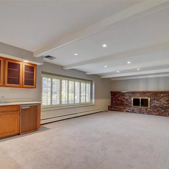 Floors By Tomorrow - Fresh carpet in a lower-level rec room in Englewood. Turns a big open basement into a room people actually use. - Flooring Near Me Floors By Tomorrow - Fresh carpet in a lower-level rec room in Englewood. Turns a big open basement into a room people actually use. - Flooring Near Me
