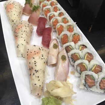 SushiStop Pasadena - Truffle salmon roll on left, nigiri, spicy tuna, salmon roll - Sushi Bars Near Me - Pasadena, California