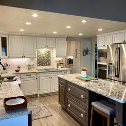 Cronic Disaster Restoration and Construction - Water damage once destroyed this kitchen, but now it's a beautiful farmhouse kitchen remodel.