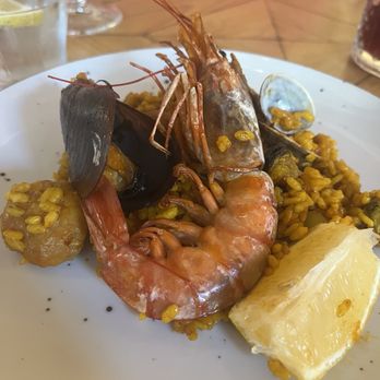 Gusto - One serving of seafood paella with butifarra sausage added - Spanish Near Me - Seville, SE