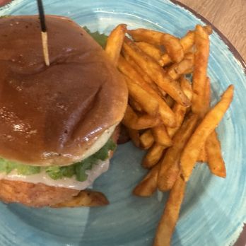 The Sandbar Beach Eats - Fries with dirty bird - Bars Near Me - Hilton Head Island, South Carolina The Sandbar Beach Eats - Fries with dirty bird - Bars Near Me - Hilton Head Island, South Carolina