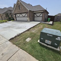 Trinity Construction - Driveway replacement. We added soil on edges and cut the joint lines in and water done to slow cure time. Customer very happy with us.