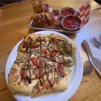 Juniper Kitchen - Johnny Utah pizza and The Dude Stromboli! - Pizza Near Me - Price, Utah
