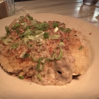 Haberdish - Biscuits & Gravy - open face biscuits (2), sausage gravy, green onion, & paprika - Southern Near Me - Charlotte, North Carolina Haberdish - Biscuits & Gravy - open face biscuits (2), sausage gravy, green onion, & paprika - Southern Near Me - Charlotte, North Carolina