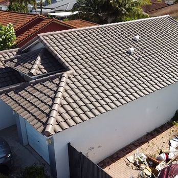 Green Home Roofing - Espresso brown concrete s tiles - Roofing Near Me