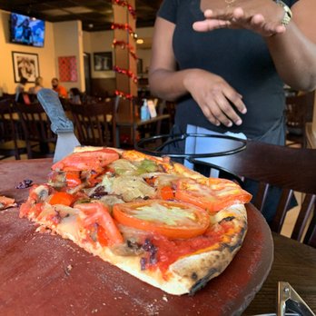 Anthony's Coal Fired Pizza & Wings - a woman wearing a face mask - Pizza Near Me - Pinecrest, Florida Anthony's Coal Fired Pizza & Wings - a woman wearing a face mask - Pizza Near Me - Pinecrest, Florida