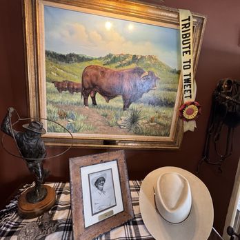 Cherokee Ranch & Castle - A painting of the stud bull for Cherokee Ranch. Photo of Tweet beneath it. - Venues & Event Spaces Near Me - Sedalia, Colorado