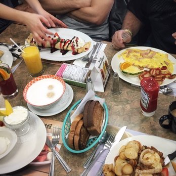 Tutti Frutti - a table full of food and drinks - Breakfast & Brunch Near Me - Quebec City, Quebec Tutti Frutti - a table full of food and drinks - Breakfast & Brunch Near Me - Quebec City, Quebec