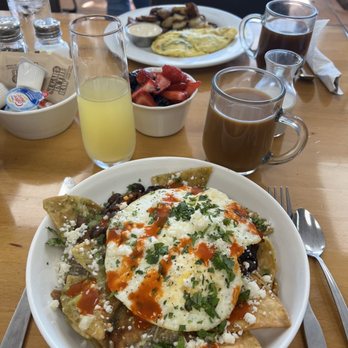 Brunch - Chilaquiles with fried eggs. Berries and mimosa. - Breakfast & Brunch Near Me - Paso Robles, California Brunch - Chilaquiles with fried eggs. Berries and mimosa. - Breakfast & Brunch Near Me - Paso Robles, California