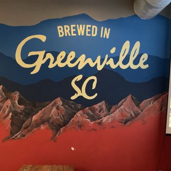 Tetrad Brewing Company - Mural on wall adjacent to the brew barrels. - Beer Bar Near Me - Greenville, South Carolina