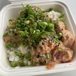 Mini poke with white rice, spicy ahi, green onion, and furikake Mini poke with white rice, spicy ahi, green onion, and furikake