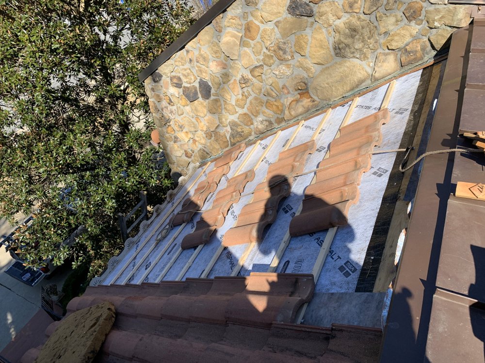 Slide of J & J Roofing