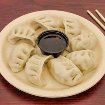 Panda House - a plate of dumplings with dipping sauce - Chinese Near Me - South Plainfield, New Jersey Panda House - a plate of dumplings with dipping sauce - Chinese Near Me - South Plainfield, New Jersey