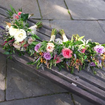 Floral Concepts By Tom - Bridal Bouquet (Left) and bridesmaids bouquets (right) - Florists Near Me - Agawam, Massachusetts Floral Concepts By Tom - Bridal Bouquet (Left) and bridesmaids bouquets (right) - Florists Near Me - Agawam, Massachusetts