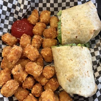 Purple Parrot Grill - Key West Shrimp BLT Wrap with tater tots - Bars Near Me - Rehoboth Beach, Delaware Purple Parrot Grill - Key West Shrimp BLT Wrap with tater tots - Bars Near Me - Rehoboth Beach, Delaware