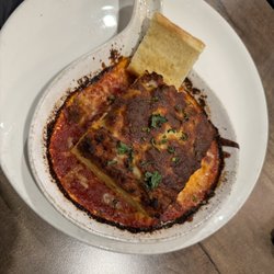 Similar to lasagna but slightly on the dry side.