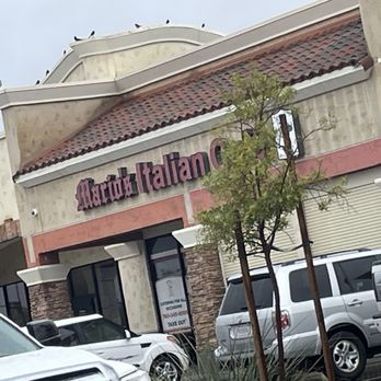 Mario's Italian Cafe - Outside view. Parking is crowded. Worth the hunt for a space! - Italian Near Me - Palm Desert, California Mario's Italian Cafe - Outside view. Parking is crowded. Worth the hunt for a space! - Italian Near Me - Palm Desert, California