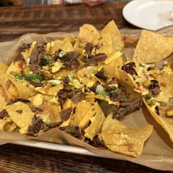 ROAM Kitchen + Bar - Saddest nachos in town only $16 - New American Near Me - Sioux Falls, South Dakota
