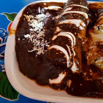 Casa México - Enmoladas  Chicken and mole sauce. - Mexican Near Me - Ottawa, Ontario