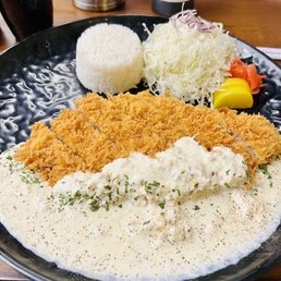 Pork cutlet with Carbonara seafood sauce