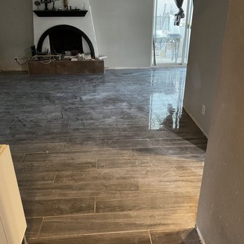 Restoration & Remodeling - Living room tile - Damage Restoration Near Me Restoration & Remodeling - Living room tile - Damage Restoration Near Me