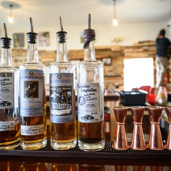 Snitching Lady Distillery - The bottles. - Distilleries Near Me - Fairplay, Colorado