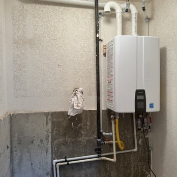 Lantz's Mountainside Plumbing - New tankless water heater unit! Please disregard the rag on the wall - Plumbing Near Me - Conifer, Colorado Lantz's Mountainside Plumbing - New tankless water heater unit! Please disregard the rag on the wall - Plumbing Near Me - Conifer, Colorado