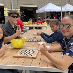 University of Hawaiʻi - West Oʻahu - Dad & kids playing KONANE.