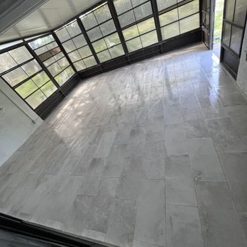 Avila’s Flooring - a view of a room with a large window - Flooring Near Me Avila’s Flooring - a view of a room with a large window - Flooring Near Me