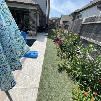 Creative Landscaping N Irrigation - a lawn with a blue umbrella - Landscaping Near Me Creative Landscaping N Irrigation - a lawn with a blue umbrella - Landscaping Near Me