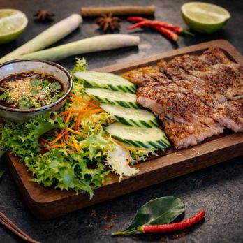 Thai Lotus - Crying Tiger Juicy, grilled steak served with fresh veggies and our bold Thai dipping sauce--sweet, savory, and just the right kick. - Thai Near Me - Auburn Hills, Michigan Thai Lotus - Crying Tiger Juicy, grilled steak served with fresh veggies and our bold Thai dipping sauce--sweet, savory, and just the right kick. - Thai Near Me - Auburn Hills, Michigan