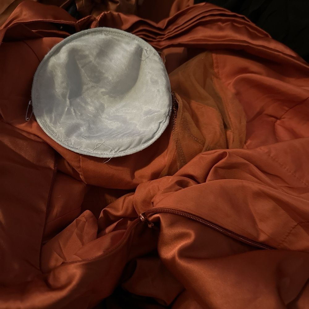 Your Cleaners - One padding installed and one left out with some pins. These aren't the pads I came in with. Mine were push up and installed inside. - Laundry Services Near Me - Memphis, Tennessee