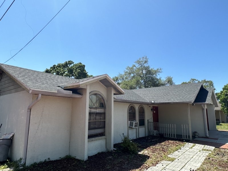 Slide of Compass Roofing Services