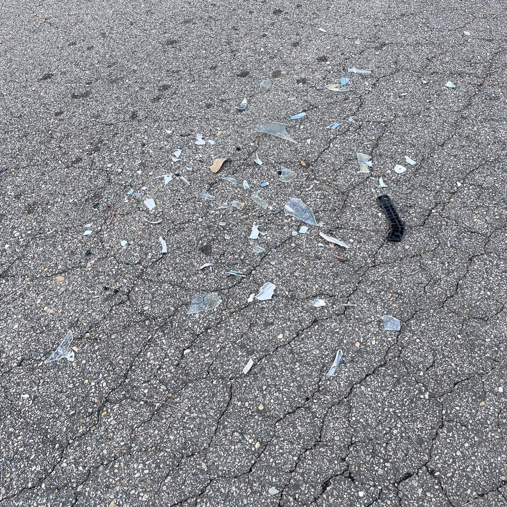 Flores Landscaping & Tree Service - broken glass on the ground - Tree Services Near Me - Durham, North Carolina