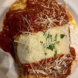 Moustos Pasta & Grill - Lasagna lunch portion.  Enough for 2 people.  Covered in thick melted cheese.  You really need to be a cheese lover for this.