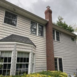 BrainStorm Home Improvement - New Chimney with bricks