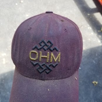 Ohm Electrical Contracting - One of our OHM hats well-worn from work well done. - Electricians Near Me Ohm Electrical Contracting - One of our OHM hats well-worn from work well done. - Electricians Near Me