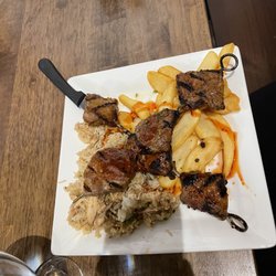 Mayta's Peruvian Cuisine - Steak Kabobs served with 2 sides.